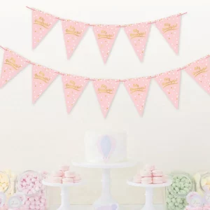 Bandeirola premium para celebrações de aniversário. 2. Design elegante em rosa dourado com a palavra 'Feliz Aniversário'.