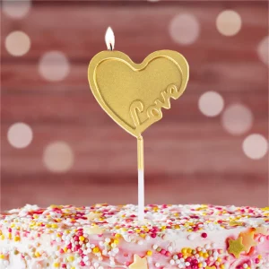 Ilumine seu aniversário com esta linda vela dourada em formato de coração