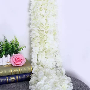 Flores artificiais impressionantes e realistas de 1000cm ideais para decorações de festas.Perfeitamente brancas para combinar com qualquer tema de festa e dar um toque elegante.Facilmente incorporadas em qualquer configuração devido ao seu tamanho generoso. Orquídeas brancas artificiais de 1000cm