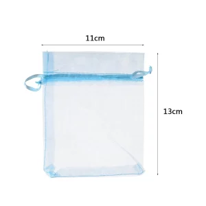 Perfeita para aniversários e outras ocasiões.Embalagem contém 5 sacos de doces de organza.Cor de azul claro atraente.Tamanho prático de 11cm. Sacos de doces de organza em azul claro
