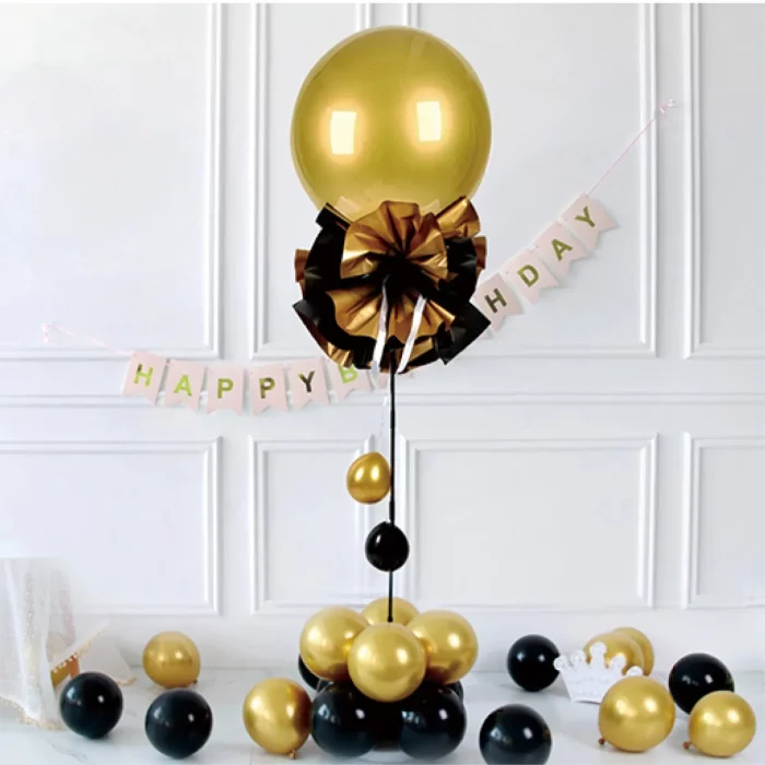 Destaque perfeito para aniversários com seu design elegante em preto e dourado.Fácil de montar